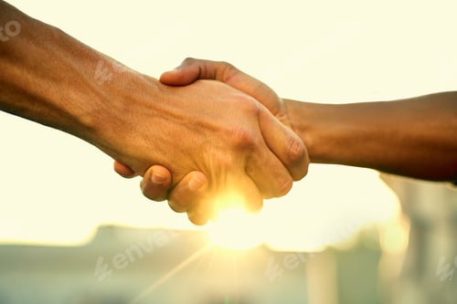 Preview: Come together, do great things. Cropped shot of two people shaking hands outdoors.