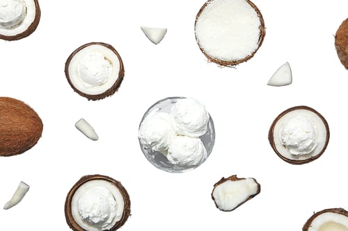 Preview: Coconuts and ice cream artfully arranged, on white