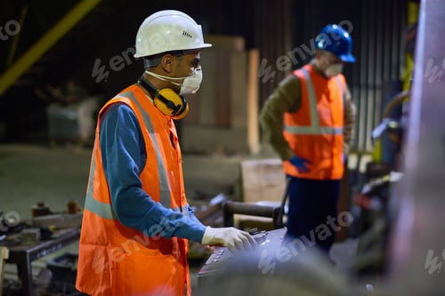 Preview: Workers at Metalwork Plant