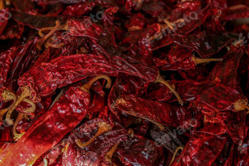 Preview: Heap of dry chilli peppers, above view