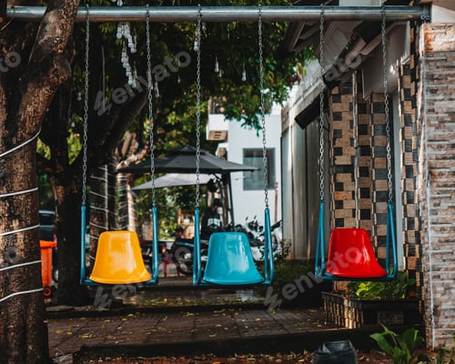Preview: three different color swings in the park