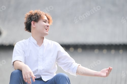 Preview: A young man with his hairstyle and the atmosphere of living in the community.