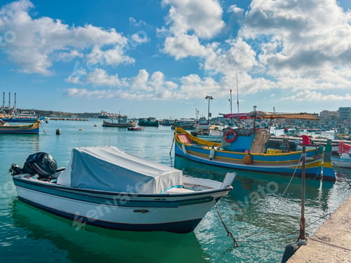 Preview: Fishing boats in the harbor of Marsaxlokk, Malta in a beautiful sunny day