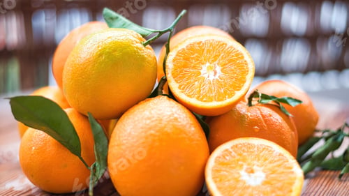 Preview: fresh juicy oranges on wooden table