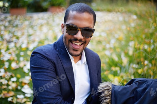 Preview: Portrait of Happy confident young African-American businessman in formal wear