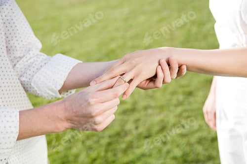 Preview: Couple getting married outdoors