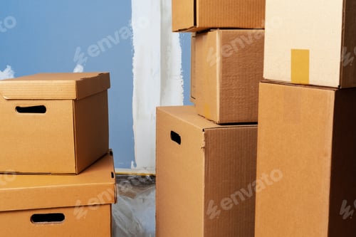 Preview: Close up of moving carton boxes in an empty room