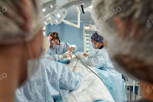Preview: Surgical Team Performing Operation in Bright Hospital Room