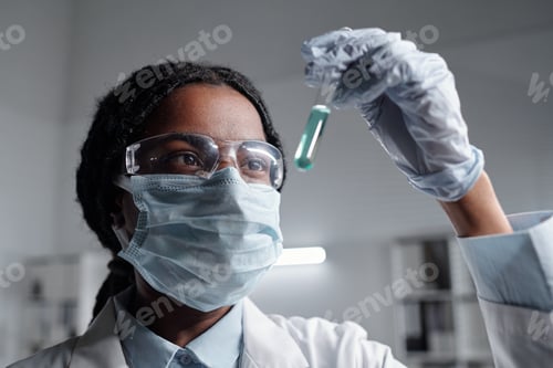 Preview: Scientist Analyzing Sample in Laboratory Setting