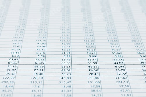 Preview: Business data financial report print close up. Blue toned.