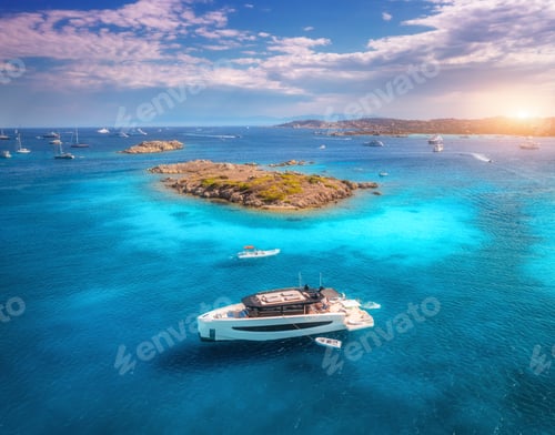 Preview: Luxury yacht on blue sea and small island at sunny day in summer