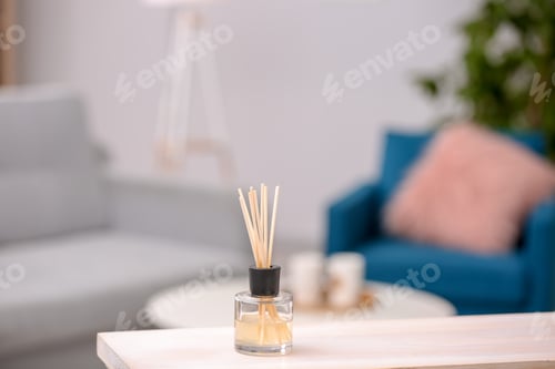 Preview: Handmade reed freshener on table against blurred background