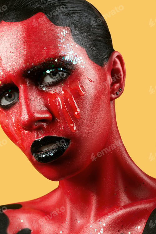 Preview: Fantastic Girl With Red Skin On A Yellow Background And White Teeth And Black Lips