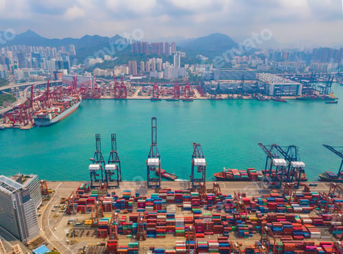 Preview: container cargo ship in the export and import business and logistics. Shipping to the harbor