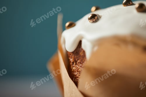 Preview: close up of easter cake decorated with sprinkles on turquoise