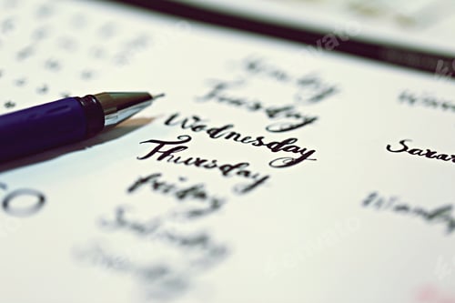 Preview: Weekend day writes on white paper closeup background