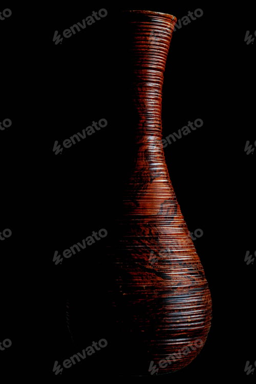 Preview: Old vase on a black background