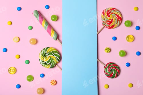 Preview: Different tasty candies and card with space for text on color background, flat lay