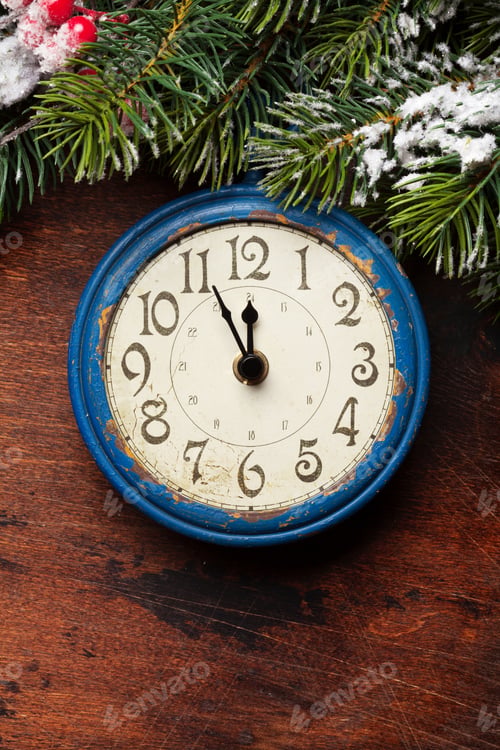 Preview: Christmas fir tree and alarm clock over old wood