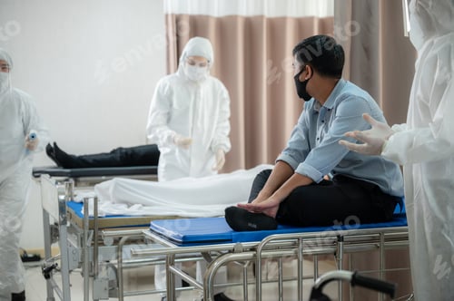Preview: Hospital doctor patient mask covid virus pandemic stress emergency nurse protective suit comfort
