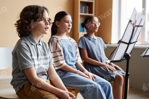 Preview: Children singing during music lesson