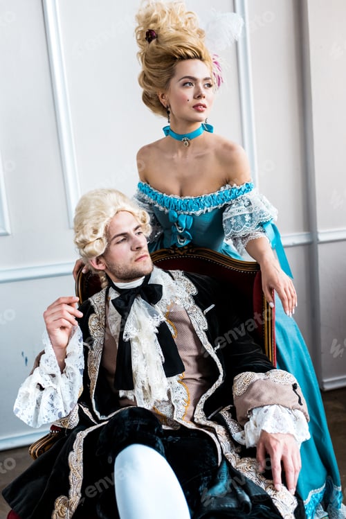 Preview: victorian woman standing near man in wig sitting on antique chair