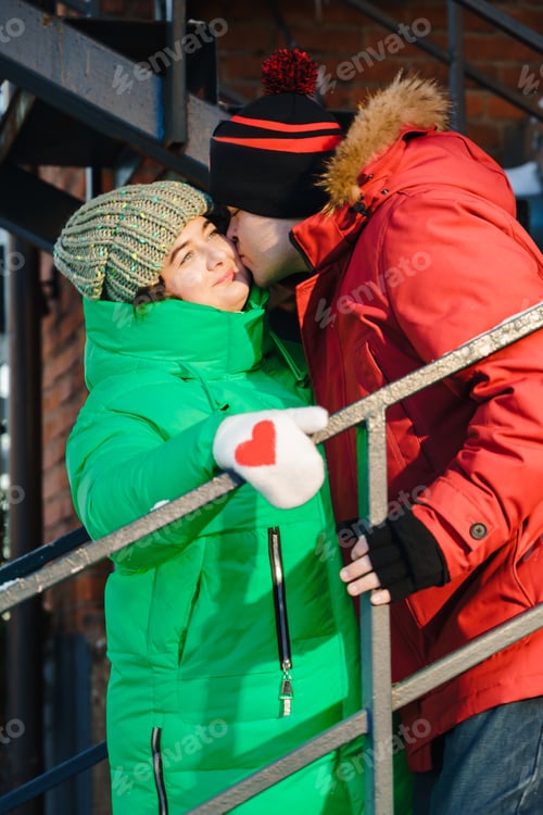 Preview: Winter plus size couple lovestory. Happy smiling man, body positive woman outdoors in bright warm