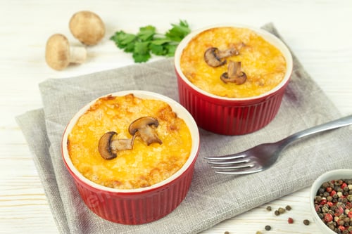 Preview: French Julienne Casserole with Chicken and Mushroom in Portion Ramekin on White Background
