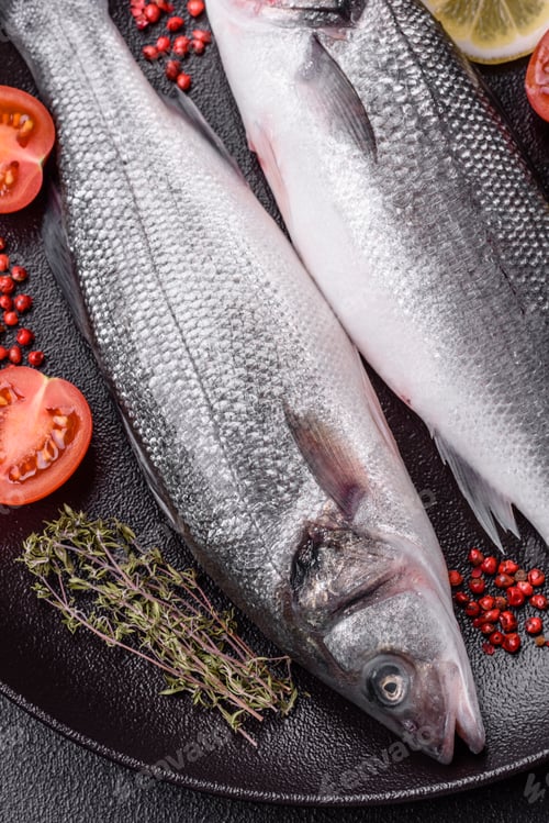 Preview: Fresh raw ocean sea bass fish with salt, spices and herbs