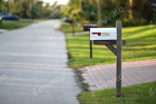 Preview: Typical american outdoors mail box on suburban street side