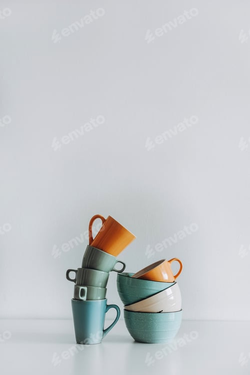 Preview: Minimalist abstract composition with cups and bowls.