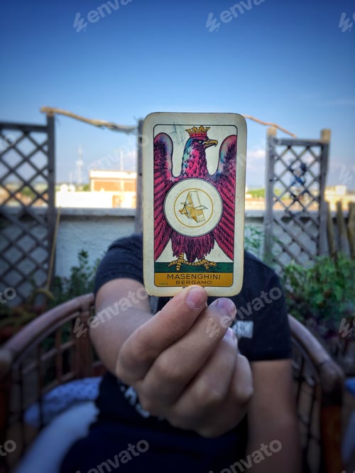 Preview: Boy holding an italian card