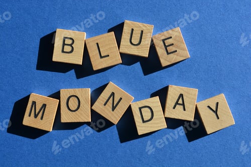 Preview: Blue Monday, words in 3D wooden alphabet letters isolated on blue background