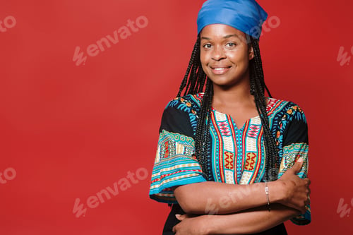 Preview: Self-confident young woman in typical African costume
