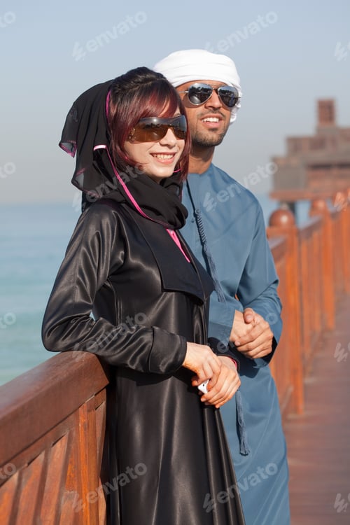 Preview: Middle Eastern people and fence, outdoors
