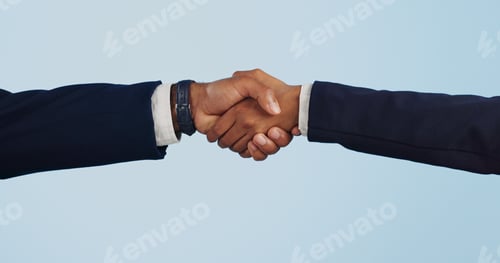 Preview: Business people, handshake and meeting for partnership, deal or agreement against a blue studio bac