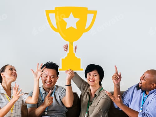Preview: Workers celebrating their success with a trophy