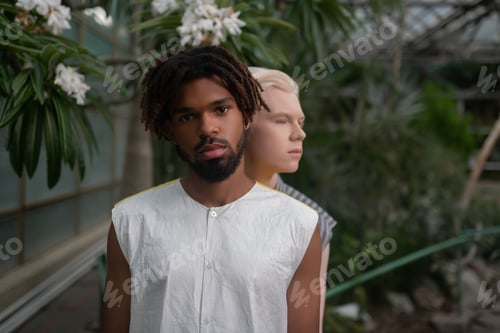 Preview: Bearded African American man standing near his friend