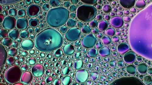 Preview: Abstract Colorful Food Oil Drops Bubbles and spheres Flowing on Water Surface