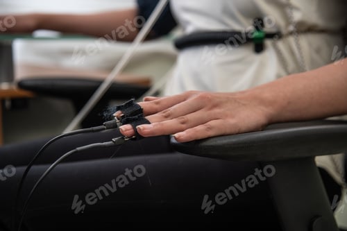 Preview: woman in polygraph test with measuring devices