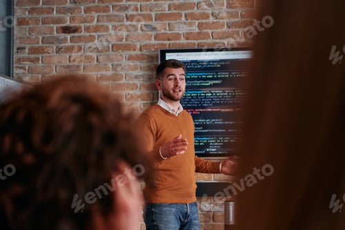 Preview: In a corporate setting businessman leads a meeting, passionately presenting a business plan to his