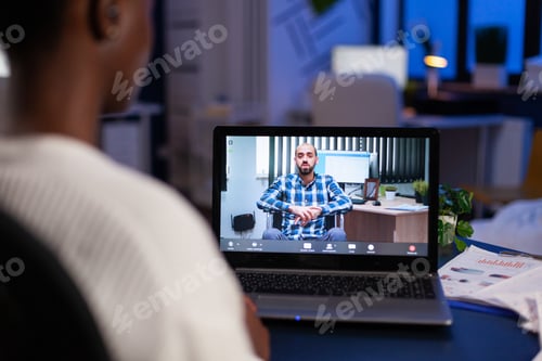 Preview: African american entrepreneur talking with remote partner