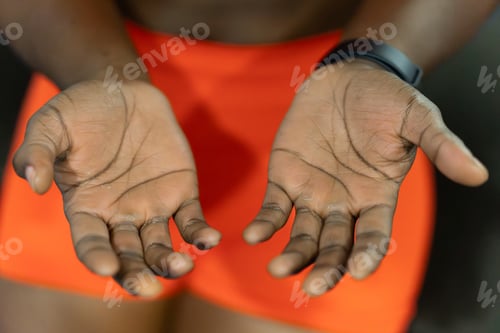 Preview: Human hands with dark skin showing open palms