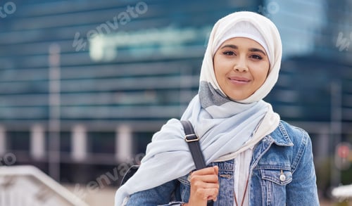 Preview: Portrait beautiful muslim woman smiling confident wearing hajib headscarf in city