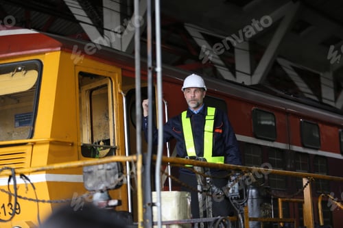 Preview: Man engineer standing on construction site of subway or maintenance equipment in factory