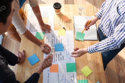 Preview: Business People Discussing Big Project