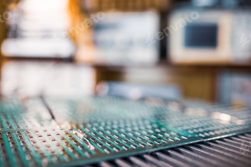 Preview: Close-up side view of a panel of SMD resistors