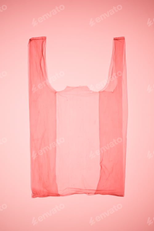 Preview: transparent plastic bag under pink toned light