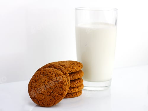 Preview: Delicious Cookies and Milk on a White Surface