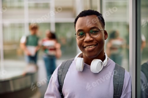 Preview: Portrait of happy black student looking at camera.